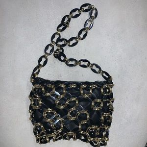 Vintage like bag with leather and chain link